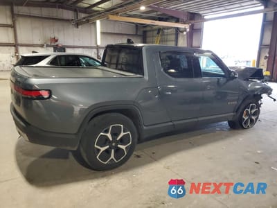 Trzecie zdjęcie samochodu z tyłu: 2022 RIVIAN R1T ADVENTURE VIN:7FCTGAAAXNN009136 - miniatura