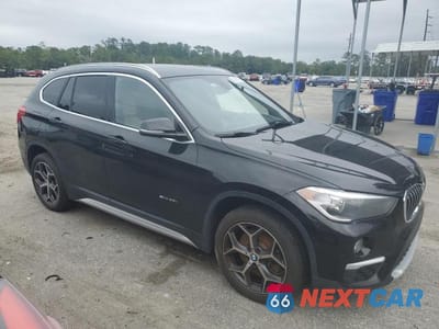 Czwarte zdjęcie samochodu z boku: 2018 BMW X1 SDRIVE28I VIN:WBXHU7C3XJ5H45709 - miniatura