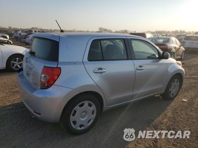 Trzecie zdjęcie samochodu z tyłu: 2012 TOYOTA SCION XD VIN:JTKKU4B42C1018656 - miniatura