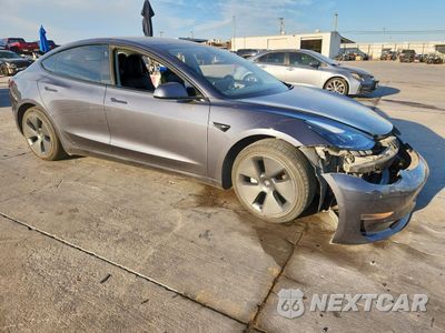 Czwarte zdjęcie samochodu z boku: 2021 TESLA MODEL 3 VIN:5YJ3E1EA7MF098134 - miniatura