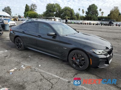 Czwarte zdjęcie samochodu z boku: 2023 BMW 530E VIN:WBA13AG08PCM36169 - miniatura