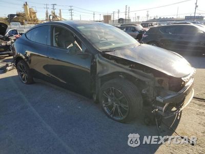 Czwarte zdjęcie samochodu z boku: 2024 TESLA Y VIN:7SAYGDEE7RF108398 - miniatura