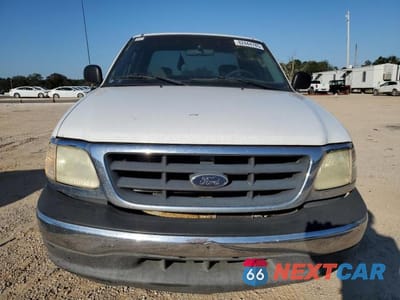 Piąte zdjęcie samochodu w środku: 2003 FORD F150 VIN:1FTRX17203NB45949 - miniatura