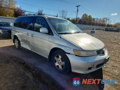 Czwarte zdjęcie samochodu z boku: 2001 HONDA ODYSSEY EX VIN:2HKRL18671H602668 - miniatura