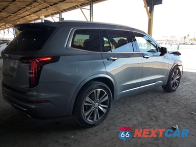 Trzecie zdjęcie samochodu z tyłu: 2022 CADILLAC XT6 PREMIUM LUXURY VIN:1GYKPCRS7NZ111247 - miniatura