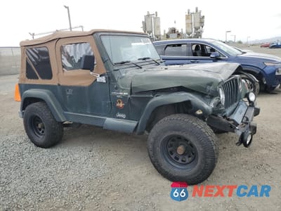 Czwarte zdjęcie samochodu z boku: 1998 JEEP WRANGLER / TJ SAHARA VIN:1J4FY49S6WP700341 - miniatura