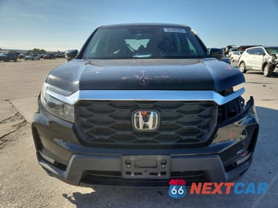 Piąte zdjęcie samochodu w środku: 2022 HONDA PASSPORT EXL VIN:5FNYF7H54NB006693 - miniatura