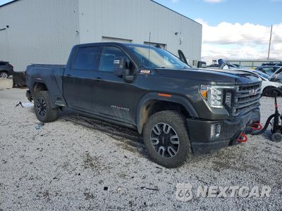 Czwarte zdjęcie samochodu z boku: 2023 GMC SIERRA K2500 AT4 VIN:1GT49PEY0PF196351 - miniatura