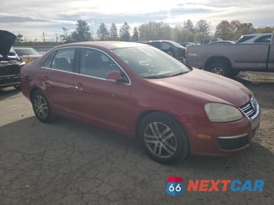 Czwarte zdjęcie samochodu z boku: 2006 VOLKSWAGEN JETTA 2.5 OPTION PACKAGE 1 VIN:3VWSF71K86M719614 - miniatura
