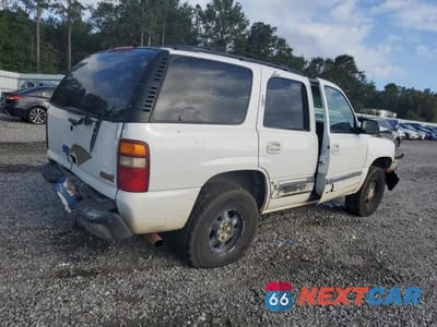 Trzecie zdjęcie samochodu z tyłu: 2003 GMC YUKON VIN:1GKEC13Z03R143547 - miniatura