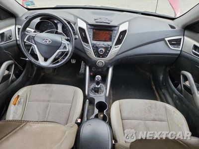 Zdjęcie 8 z 11 samochodu: 2013 HYUNDAI VELOSTER VIN:KMHTC6AD0DU095145 - miniatura