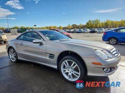 Czwarte zdjęcie samochodu z boku: 2007 MERCEDES-BENZ SL 550 VIN:WDBSK71F77F120687 - miniatura