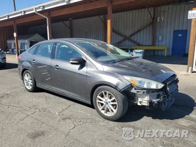 Czwarte zdjęcie samochodu z boku: 2015 FORD FOCUS SE VIN:1FADP3F20FL374743 - miniatura