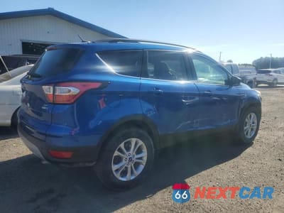 Trzecie zdjęcie samochodu z tyłu: 2017 FORD ESCAPE SE VIN:1FMCU9GD2HUD50101 - miniatura