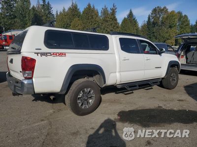 Trzecie zdjęcie samochodu z tyłu: 2023 TOYOTA TACOMA DOUBLE CAB VIN:3TMDZ5BN7PM143824 - miniatura