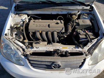 Zdjęcie 11 z 12 samochodu: 2004 TOYOTA COROLLA CE VIN:JTDBR32E242047288 - miniatura