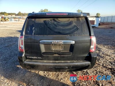 Zdjęcie 6 z 14 samochodu: 2019 GMC YUKON XL DENALI VIN:1GKS2HKJ0KR387188 - miniatura