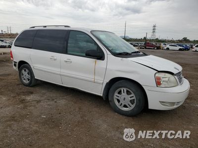 Czwarte zdjęcie samochodu z boku: 2004 FORD FREESTAR SEL VIN:2FMZA52294BA54333 - miniatura