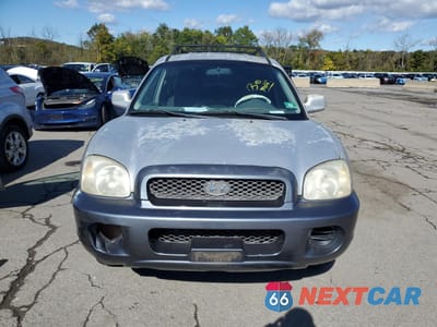 Piąte zdjęcie samochodu w środku: 2003 HYUNDAI SANTA FE GL VIN:KM8SB12B43U553900 - miniatura