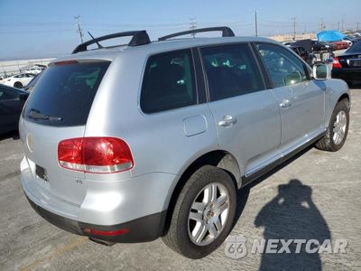 Trzecie zdjęcie samochodu z tyłu: 2006 VOLKSWAGEN TOUAREG 4.2 VIN:WVGZM77L16D054733 - miniatura