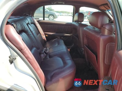 Zdjęcie 10 z 12 samochodu: 2000 BUICK PARK AVENUE VIN:1G4CW54K4Y4235151 - miniatura