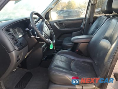 Zdjęcie 7 z 15 samochodu: 2003 MAZDA TRIBUTE ES VIN:4F2CZ96133KM41752 - miniatura