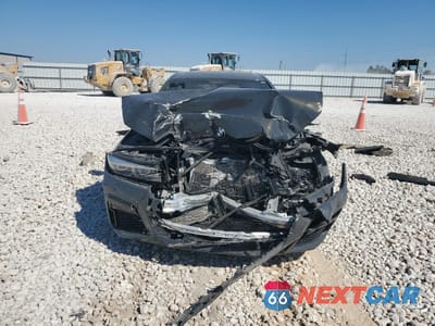 Piąte zdjęcie samochodu w środku: 2022 BMW 740 I VIN:WBA7T2C03NCJ43914 - miniatura