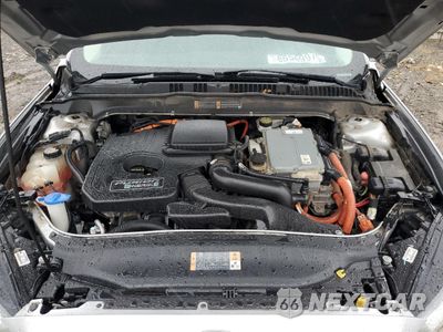 Zdjęcie 11 z 14 samochodu: 2013 FORD FUSION TITANIUM PHEV VIN:3FA6P0SU5DR274134 - miniatura