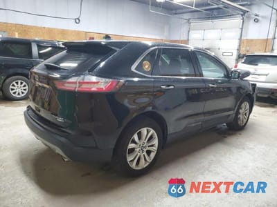 Trzecie zdjęcie samochodu z tyłu: 2020 FORD EDGE TITANIUM VIN:2FMPK4K93LBA54208 - miniatura