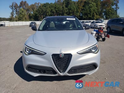 Piąte zdjęcie samochodu w środku: 2021 ALFA ROMEO STELVIO TI VIN:ZASPAKBN3M7D18831 - miniatura