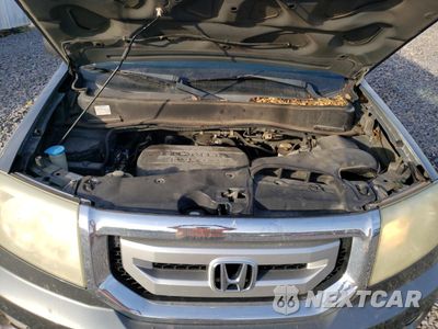 Zdjęcie 12 z 15 samochodu: 2011 HONDA PILOT EXL VIN:5FNYF3H53BB011064 - miniatura