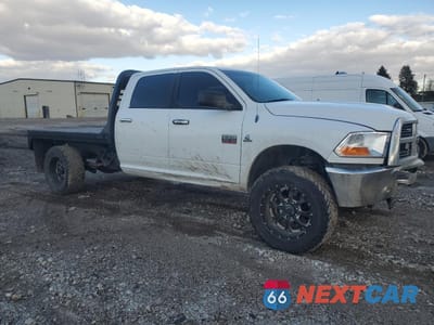 Czwarte zdjęcie samochodu z boku: 2012 DODGE RAM 2500 FLATBED TRUCK VIN:3C6UD5JL8CG161263 - miniatura