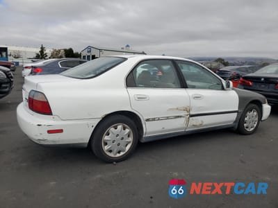 Trzecie zdjęcie samochodu z tyłu: 1997 HONDA ACCORD LX VIN:1HGCD5636VA093013 - miniatura