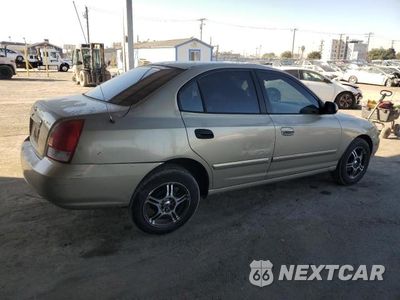Trzecie zdjęcie samochodu z tyłu: 2003 HYUNDAI ELANTRA VIN:KMHDN45D73U566350 - miniatura