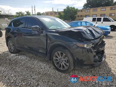 Czwarte zdjęcie samochodu z boku: 2024 MAZDA CX-5 PREMIUM VIN:JM3KFBDM2R0365753 - miniatura