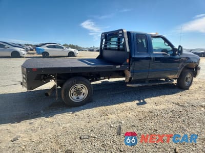 Trzecie zdjęcie samochodu z tyłu: 1999 FORD F250 SUPER DUTY VIN:1FTNX21F0XEB02380 - miniatura