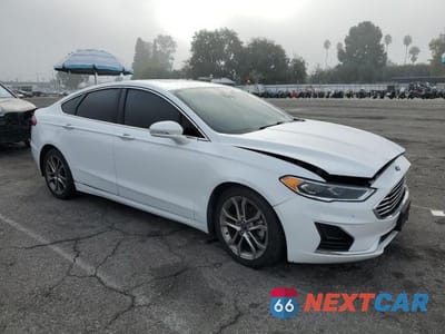 Czwarte zdjęcie samochodu z boku: 2019 FORD FUSION VIN:3FA6P0CDXKR237625 - miniatura