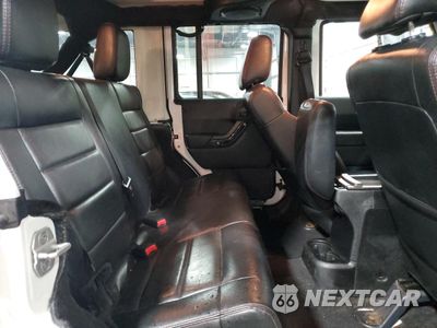 Zdjęcie 11 z 15 samochodu: 2012 JEEP WRANGLER UNLIMITED SAHARA VIN:1C4BJWEGXCL261511 - miniatura