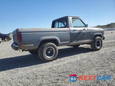 Trzecie zdjęcie samochodu z tyłu: 1986 FORD RANGER VIN:1FTCR11T3GUB45246 - miniatura