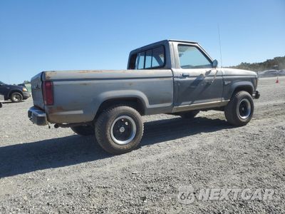 Trzecie zdjęcie samochodu z tyłu: 1986 FORD RANGER VIN:1FTCR11T3GUB45246 - miniatura