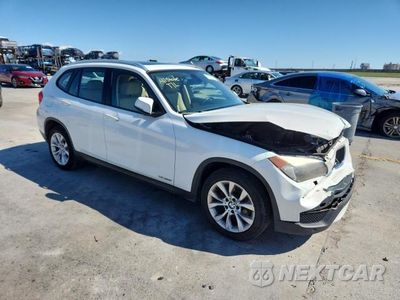 Czwarte zdjęcie samochodu z boku: 2014 BMW X1 XDRIVE28I VIN:WBAVL1C54EVR93777 - miniatura