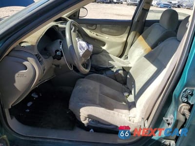 Zdjęcie 7 z 12 samochodu: 1999 OLDSMOBILE ALERO GL VIN:1G3NL52T2XC419980 - miniatura