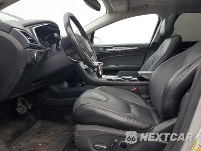 Zdjęcie 7 z 14 samochodu: 2013 FORD FUSION TITANIUM PHEV VIN:3FA6P0SU5DR274134 - miniatura