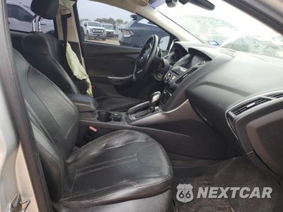 Zdjęcie 7 z 13 samochodu: 2012 FORD FOCUS TITANIUM VIN:1FAHP3J21CL342839 - miniatura