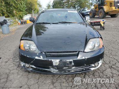 Piąte zdjęcie samochodu w środku: 2003 HYUNDAI TIBURON VIN:KMHHN65F13U077098 - miniatura