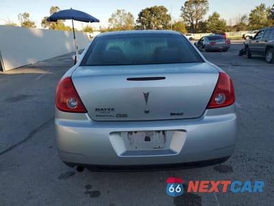 Zdjęcie 6 z 14 samochodu: 2010 PONTIAC G6 VIN:1G2ZA5E02A4139166 - miniatura
