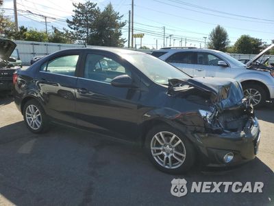 Czwarte zdjęcie samochodu z boku: 2014 CHEVROLET SONIC LT VIN:1G1JC5SG4E4154321 - miniatura