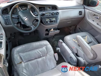 Zdjęcie 8 z 13 samochodu: 2002 HONDA ODYSSEY EXL VIN:2HKRL18022H535796 - miniatura