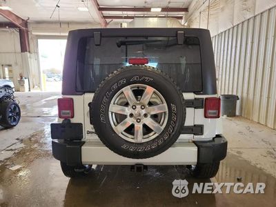 Zdjęcie 6 z 12 samochodu: 2013 JEEP WRANGLER UNLIMITED SAHARA VIN:1C4BJWEG7DL667683 - miniatura