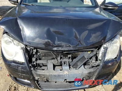 Zdjęcie 11 z 14 samochodu: 2010 VOLKSWAGEN EOS LUX VIN:WVWFA7AH0AV014358 - miniatura